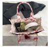 2025 Hot-Selling Large Capacity Canvas Tote: Stylish Commuter & Crossbody Bag.