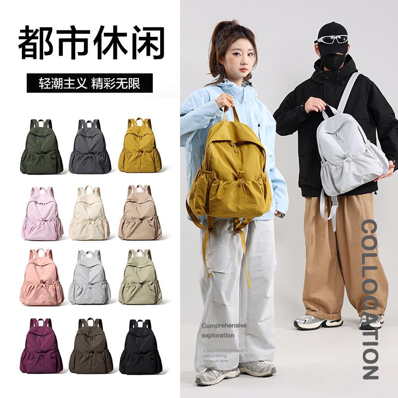 Schoolbag new Korean version casual large-capacity student backpack men's and women's 1011 light outdoor sports mountaineering bag