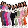 2025 European Style Color Block Sportswear Set: Stylish High-Waisted Long Pants & Casual Patchwork Two-Piece Ensemble.