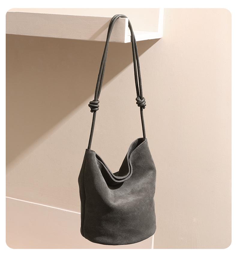 High-Mercerized Matte Cowhide Drawstring Bucket Bag - Retro Commuter Style Genuine Leather Women's Handbag with Large Capacity