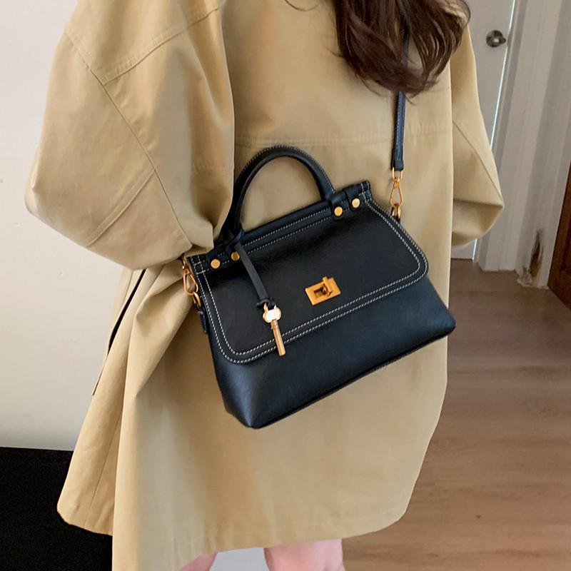 Koreanische Retro Damen Umhängetasche: Vielseitiges, Schlichtes, Atmosphärisches Design mit Großer Kapazität für den Täglichen Arbeitsweg.