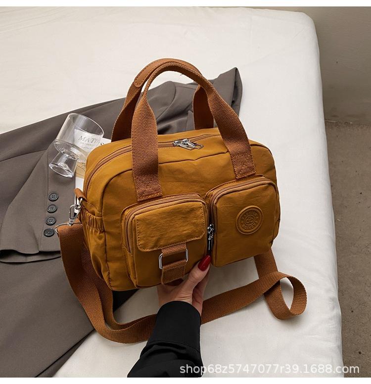 Korean Version of Casual Portable Small Square Bag Women's New Versatile Fashion Shoulder Messenger Bag Nylon Cloth Multi-pocket Pillow Bag