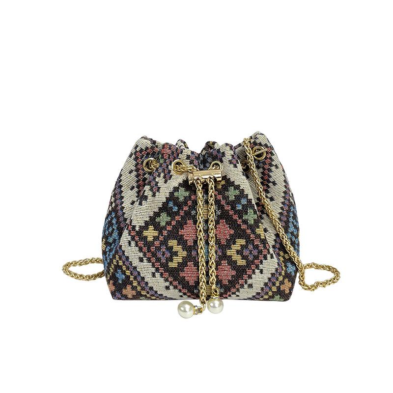 

Цього року популярна плед етнічна вітер бавовна та льон маленька сумка 2024 нова жіноча сумка сумка на ланцюжку портативне відро коричневий