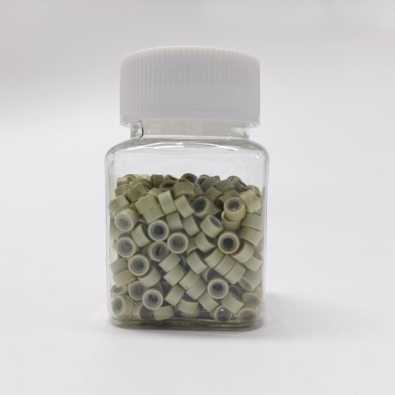 

Бесшовное кольцо для наращивания волос с силиконовой ручкой и золотой проволокой 500 pieces bottled