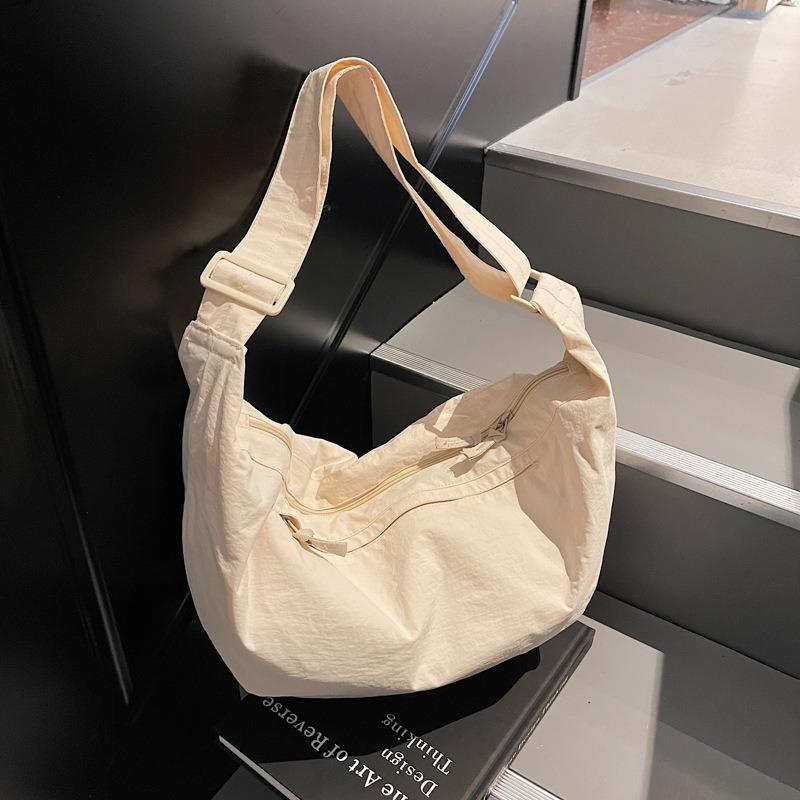 Large capacity nylon bag shoulder messenger bag new urban simple dumpling bag solid color casual student bag