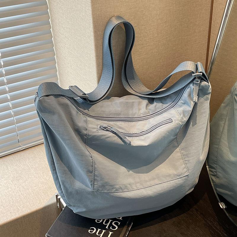 

Сумка большой вместимости женская новая высококачественная текстура нишевая летняя универсальная тканевая сумка сумка-мессенджер сумка-пельмень синий