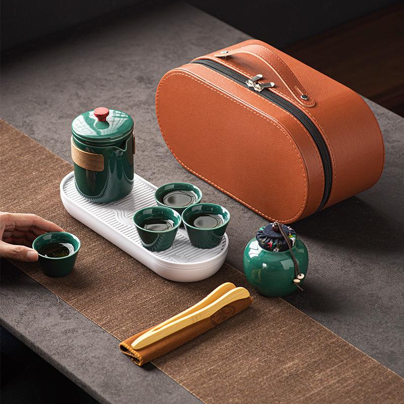 Ge kiln ceramic kung fu tea set, one pot of four cups, outdoor portable travel tea set, teacup gift souvenir