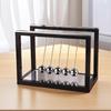 Premium resin Newton cradle sculpture,sleek black frame decor,power-free swing ornament for indoor outdoor display,modern craft for home,office layout