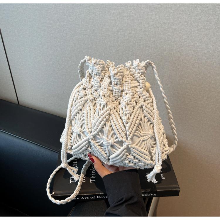 Seaside vacation wind rope woven bag women's 2025 spring and summer new beach bag crossbody bucket bag woven bag