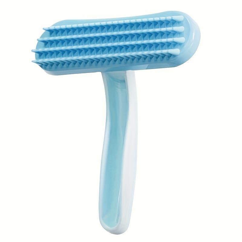 

Silicone Pet Grooming Brush with Soft Bristles and a Heart-Shaped Head - A gentle brush for detangling and massaging small pets синий