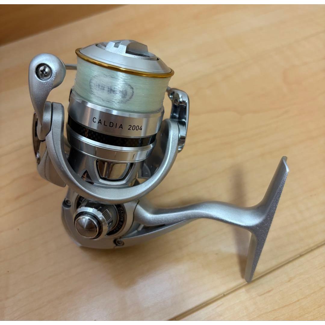 Used Daiwa CALDIA 2004 spinning reel used