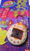 Mesutchi Tamagotchi White & Orange Bandai 1997 Edition