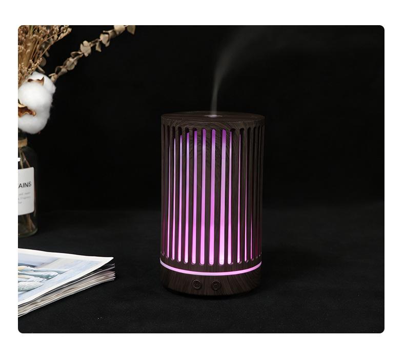 Ultrasonic Aroma Diffuser: Hollow Design, Seven-Color Night Light, Desktop Essential Oil Aromatherapy Humidifier
