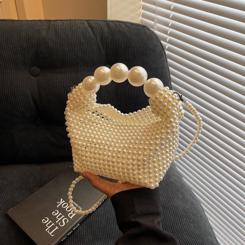Pure hand-woven dinner bag female retro fairy pearl bag trendy large capacity portable shoulder bag