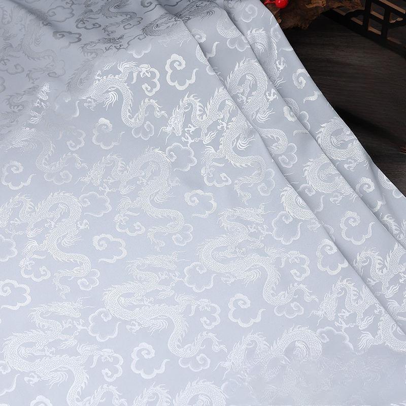 High-end dragon-patterned jacquard satin fabric suitable for wedding dresses formal gowns and designer clothing fabrics