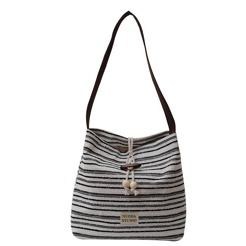 

Повседневная вязаная сумка большой вместимости женская 2025 новая универсальная сумка-мессенджер сумка для занятий для студенток сумка-ведро для поездок на работу