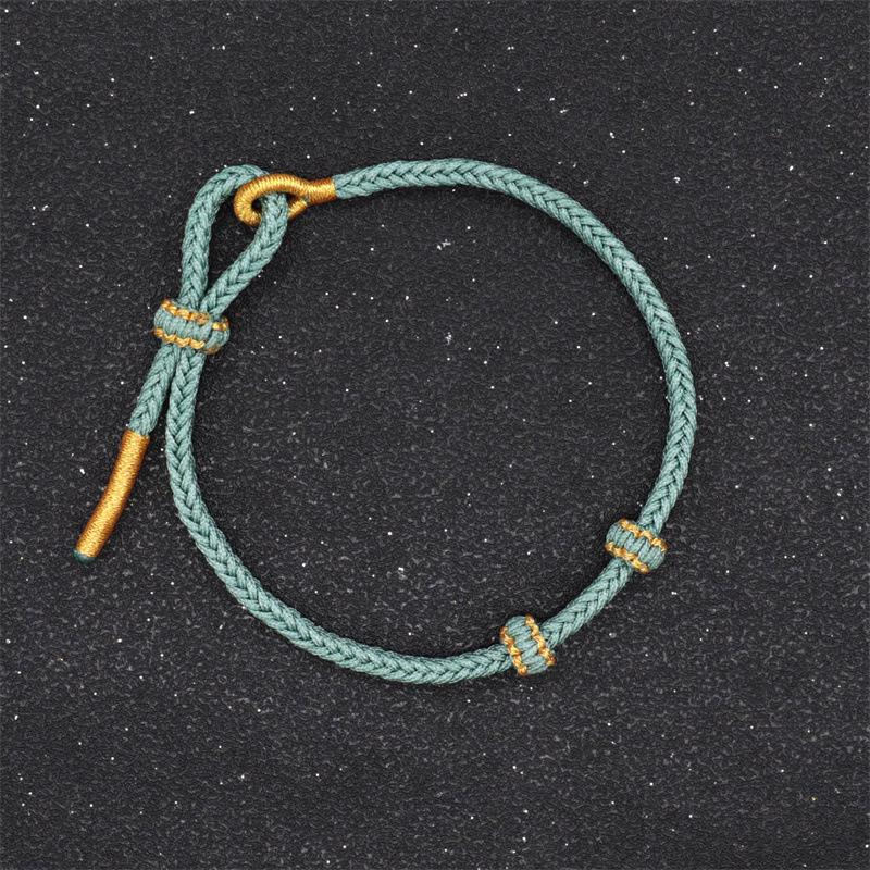 Handgewebtes Achtstrang-Knotenarmband: Halbfertiges rotes Seil mit Anhänger aus Hartgold für Paare