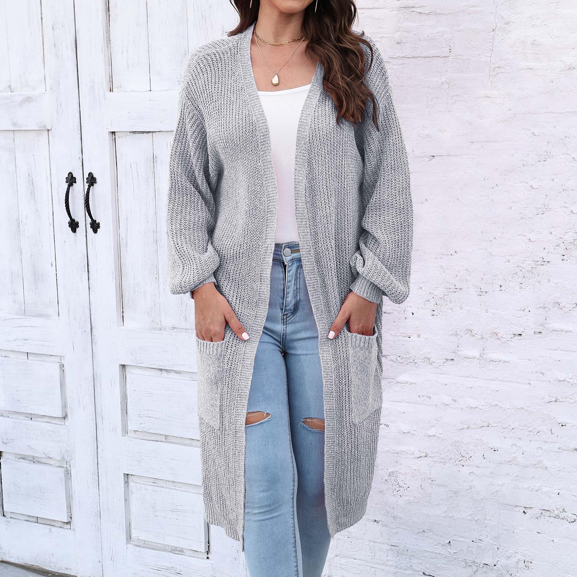 

Женский свитер средней длины с большим карманом и рукавами-фонариками на осень и зиму average size серый