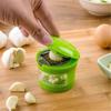 Kitchen Innovations Garlic Press, Crusher, Cutter, Mincer, and Storage Container - Includes Silicone Garlic Peeler - Easy to Clean - Stainless Steel B