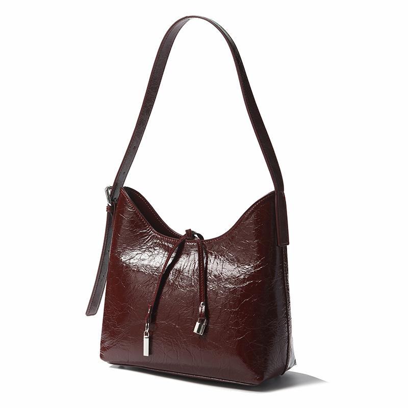 

Сумка-ведро из натуральной кожи для женщин. Модная и стильная сумка-ведро для поездок на работу. бордовый