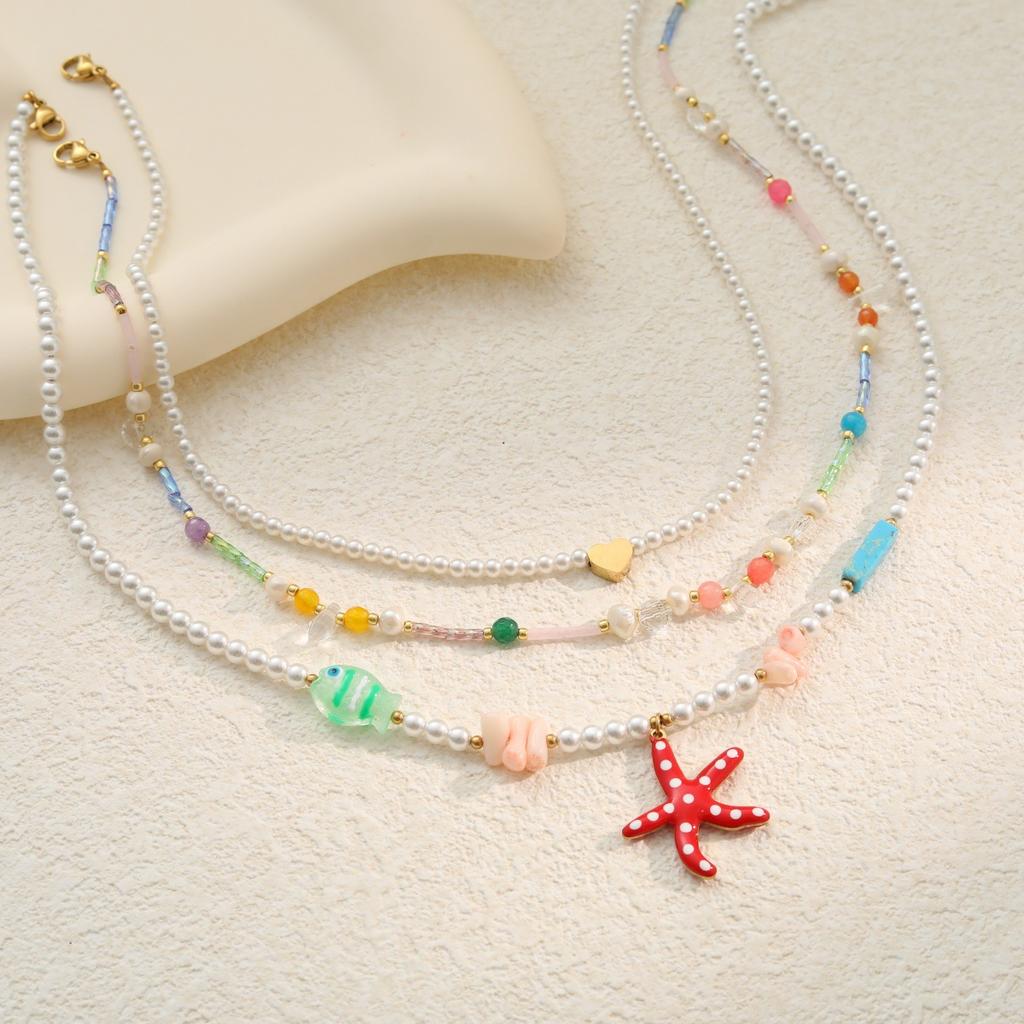 GEMCHIC Damen Bunte Seestern Anhänger Halskette Mehrschichtige Perlenkette Mode Sommer Strand Schmuck