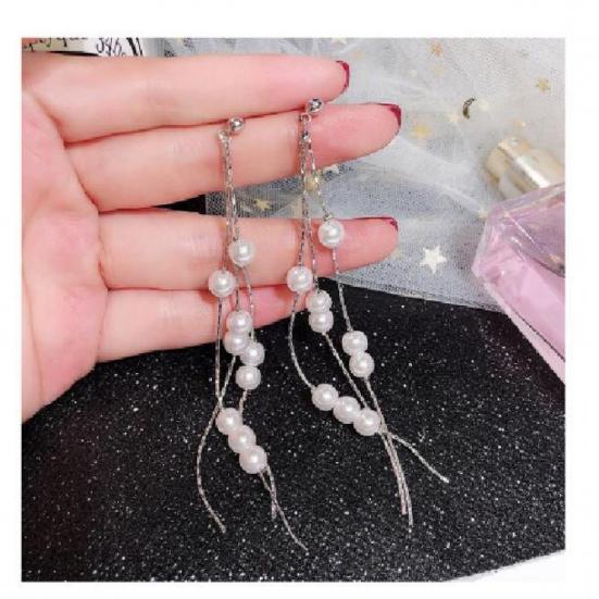 

Длинные серьги с корейским жемчугом и кисточками серебряный