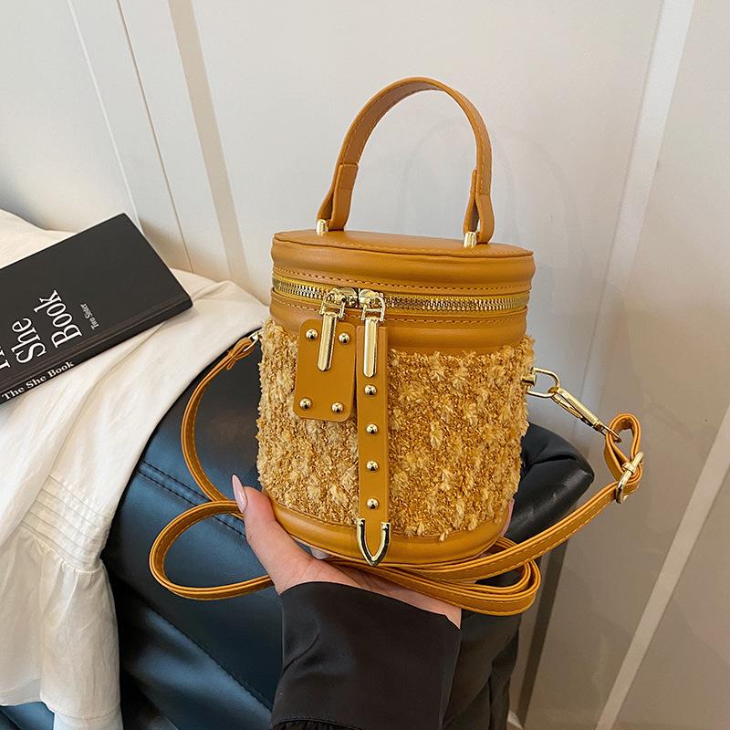 

Нишевая сумка-ведро высокого класса женская новая ретро простая на плечо через плечо сумка-мессенджер для通勤 жёлтый