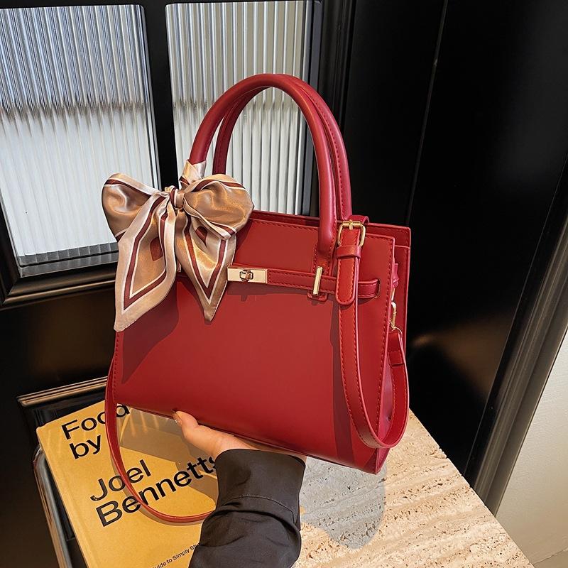 

Premium soft leather portable platinum bag women s commuter bag 2025 new fashion shoulder messenger Kelly bag красный