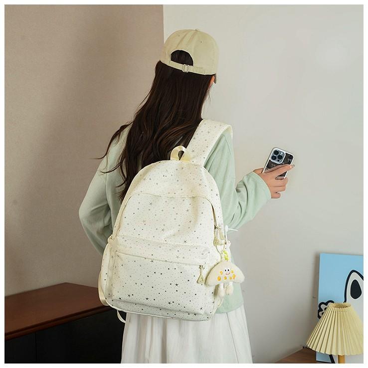 Schoolbag design sense star sequined schoolbag female small fresh solid color primary school student backpack large capacity high school backpack