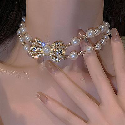Collana con pendente Bowknot di perle di moda per le donne, collana con temperamento con strass e arco, per ragazza, regalo di gioielli per la festa nuziale