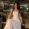 Elegant French White Sleeveless Summer Dress with Slimming Square Neck and Cinched Waist