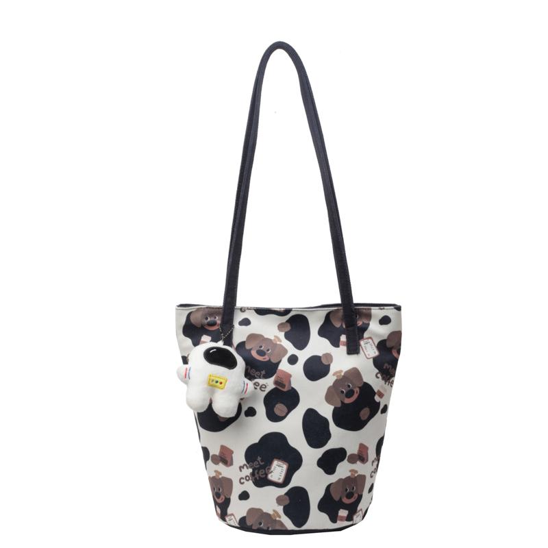 

Жіноча сумка-відро з канвасу з принтом, на плече