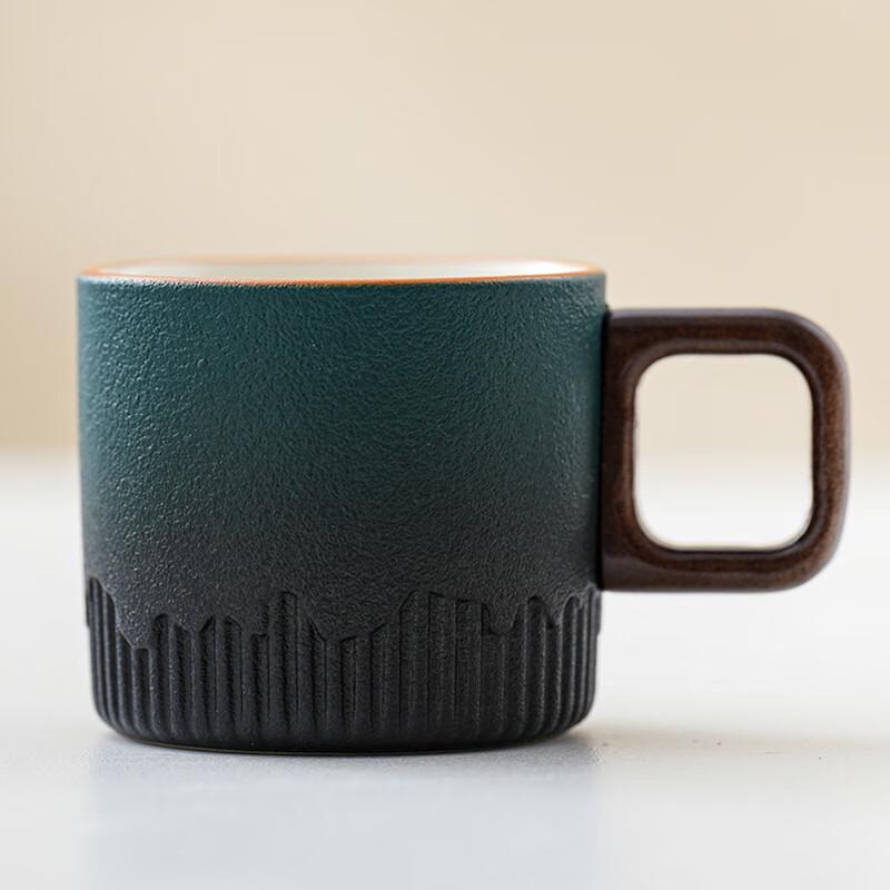 

Rustic Ceramic Coffee Cup with Wooden Handle