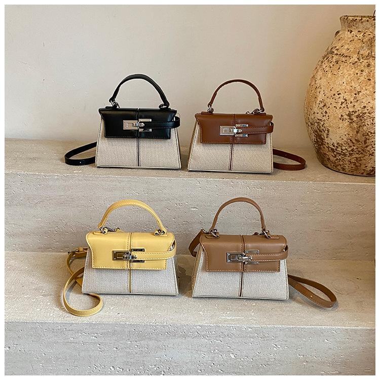 Korean version of high-quality, simple and versatile commuter handbag women's 2025 summer new niche messenger small square bag