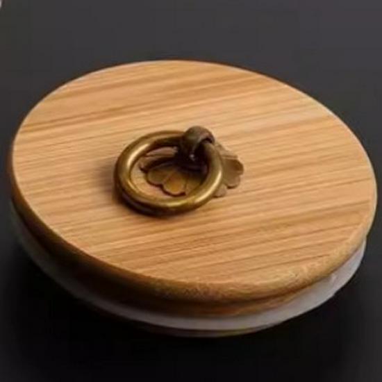 

Смугаста скляна банка у формі пелюстки для закусок, чаю, меду, кавових зерен тощо.