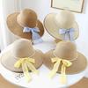 New pearl chain bow straw hat women's spring and summer big brim outdoor sunscreen hat vacation style travel sun hat