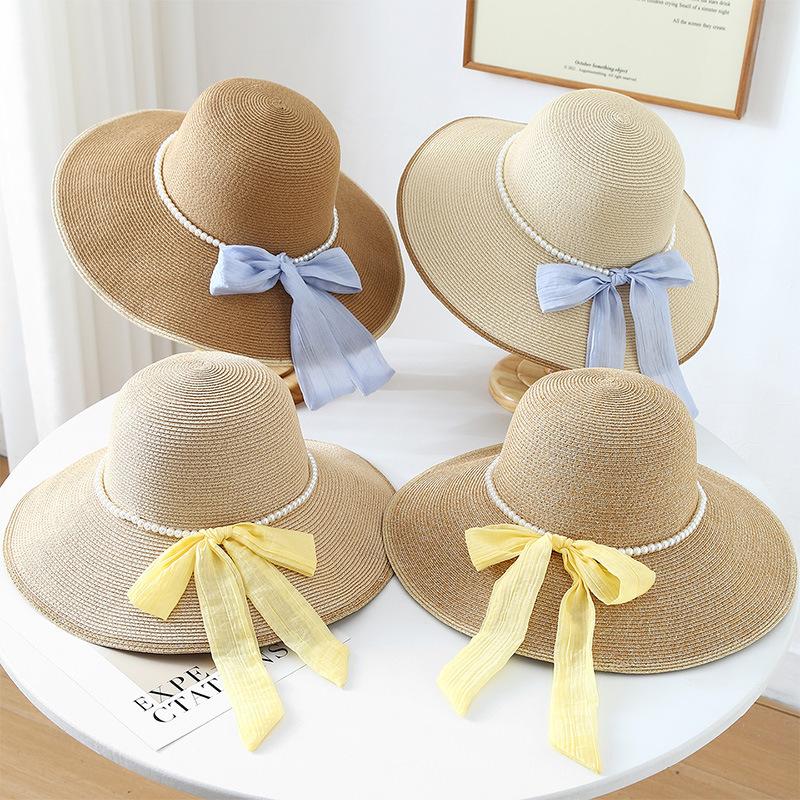 New pearl chain bow straw hat women's spring and summer big brim outdoor sunscreen hat vacation style travel sun hat