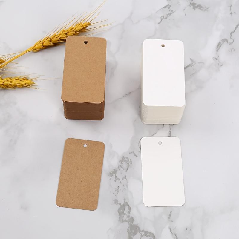 100pcs 7x4cm Paper Tag Kraft White Packaging Label With Rope DIY Label Wedding Party Gift Decorating Tag Cookie Packaging