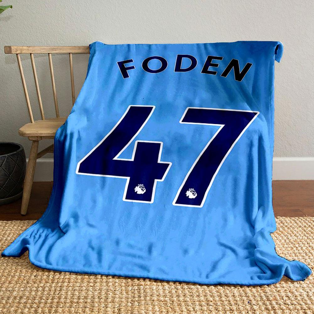 Blue background with "FODEN" and large navy "47" outlined in white. for all seasons blanket lunch break throw gift
