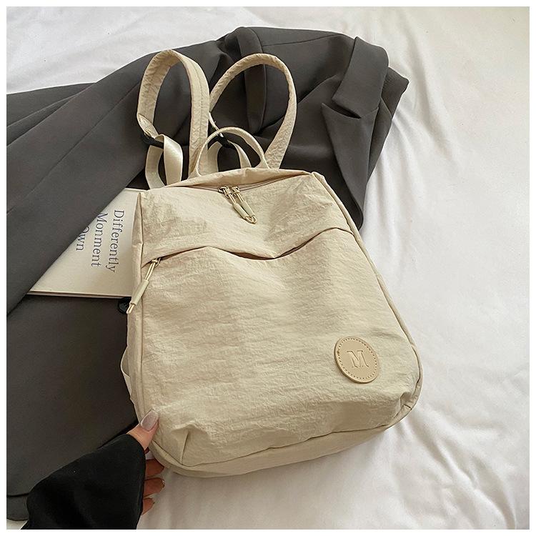 Large capacity bag new simple casual versatile backpack female college student schoolbag lightweight travel backpack