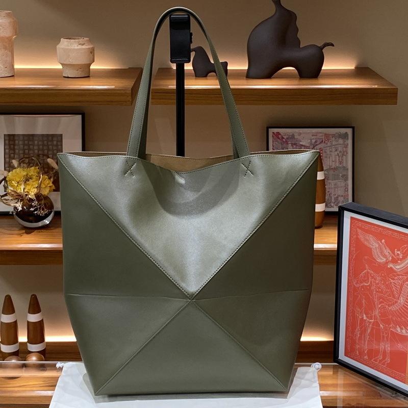 2026 New Genuine Leather Women's Bag Deformation Geometric Splicing Folding Tote Single Shoulder Diagonal Cross Trendy Manufacturer