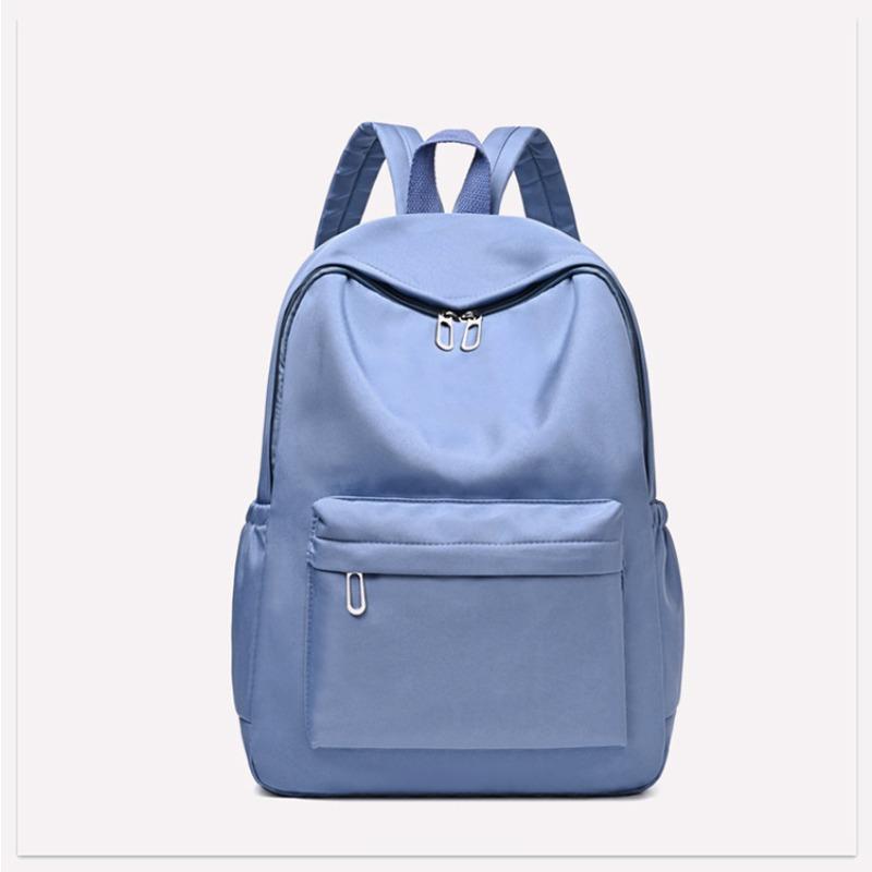 

Stylish solid color backpack, simple Oxford cloth, lightweight schoolbag, large capacity travel backpack синий