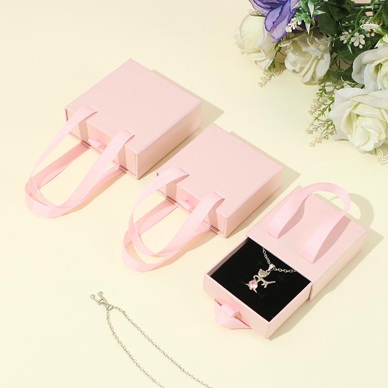 

Портативная шкатулка для украшений с выдвижными ящиками: Упаковка для ожерелий, браслетов, колец 9x9x3.2cm