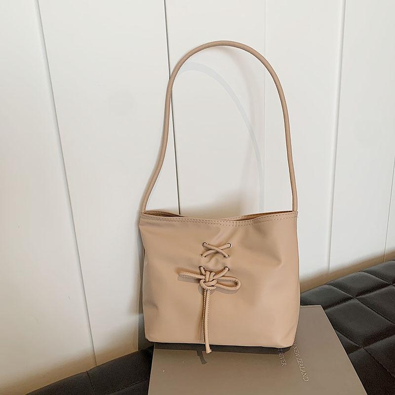 Ballet style women's bag 2025 new trend fashionable sweet handbag niche pearlescent texture shoulder bucket bag