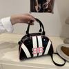 Niche design women's bags, high-end striped contrasting shoulder bags, summer new semi-round underarm bags, messenger bags