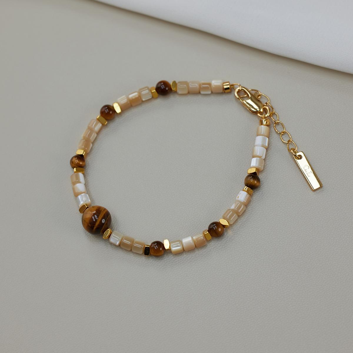 Autumn And Winter Merad Tiger S Eye Stone Necklace Fashion Fritillary Collarbone Chain Temperament Devil S Eye Horseshoe Snail Bracelet