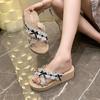 Fashion versatile slippers women's 2025 summer wear thick bottom slope with lace cross with seaside vacation cool slippers women