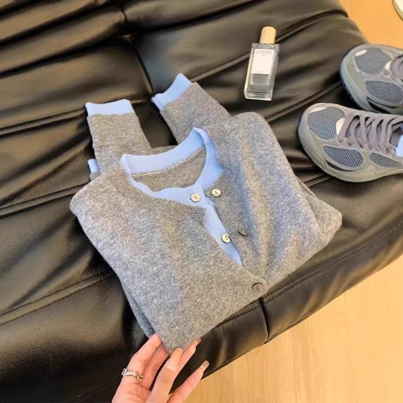 Early autumn new fake two pieces contrasting colors thin temperament knitted cardigan thin top women's long-sleeved design sense niche