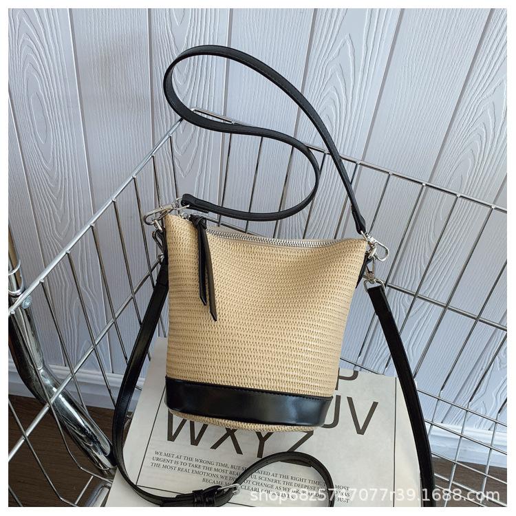 2025 new niche woven bucket bag foreign style leisure vacation hand straw bag niche design messenger bag tide