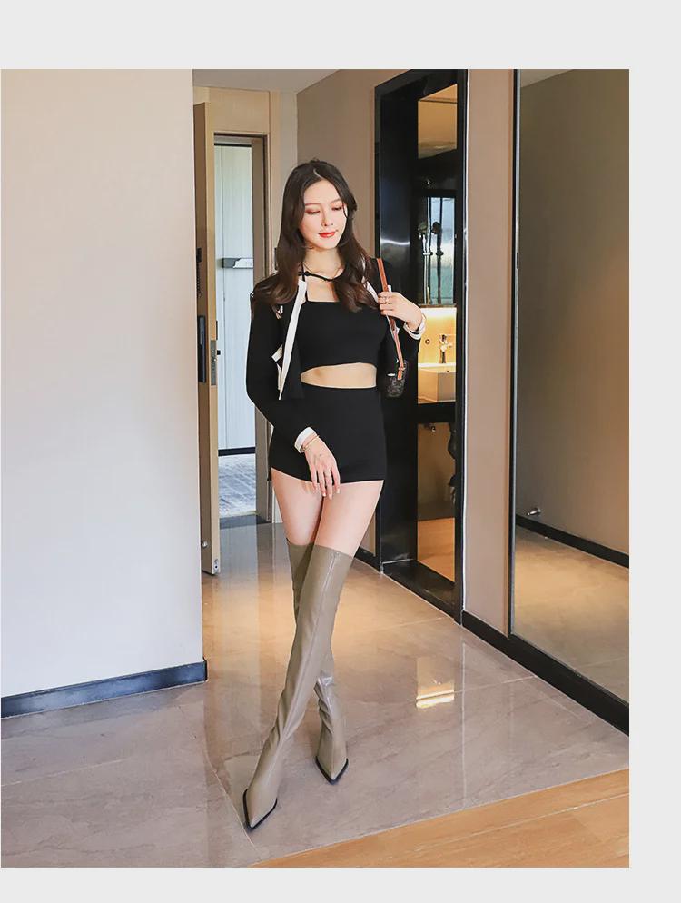 Botas elegantes de tacón alto con punta puntiaguda por encima de la rodilla de estilo europeo y americano